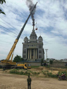 Removing crosses from churches in Zhejiang Photo: Courtesy of China Aid